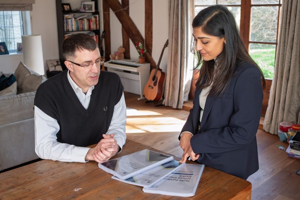 Ben Holt and Sonal Desai reviewing SEND Reform documentation